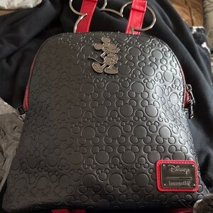 Excellent Used Condition.Loungefly Black and Red Embossed Mickey Mini Backpack